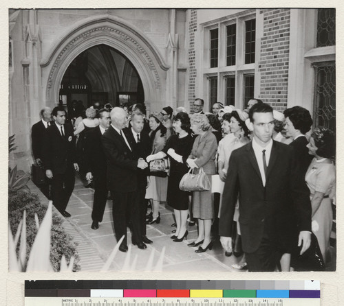 Los Angeles campus. Principal speaker at Charter Day exercises on April 2, 1963 was former President Dwight D. Eisenhower, here being escorted by Chancellor Murphy to an alumni reception