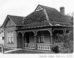 Moderately ornamented Queen Anne cottage