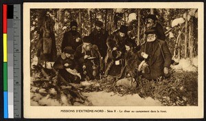 Missionary fathers eating around a campfire, Canada, ca.1920-1940