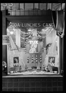 Tux Ginger Ale window display, Savoy Drug Co., 6th Street & Hope Street, Southern California, 1926