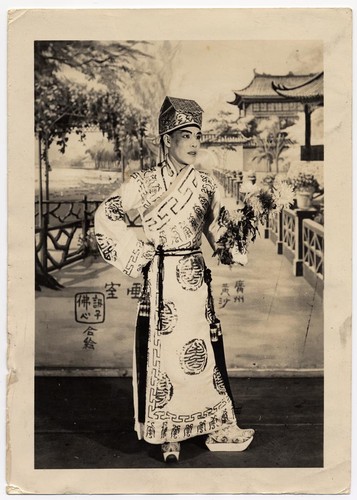 Ma Shi-tsang as a scholar holds a boquet of chrysanthemum, possibly staged at the Great Star Theatre /