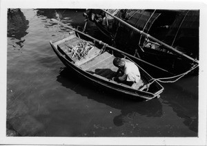 Boatman in Aberdeen Bay, Hong Kong, China, 1939