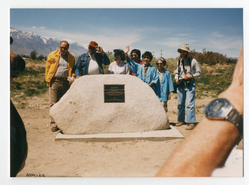 Color photo of 1986 pilgrimage showing presentation and dedication of National Historic Landmark plaque and marker with Sue Embrey waving