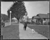 Boxer Wally Hall goes for a run with his dog Queen, Los Angeles, 1936