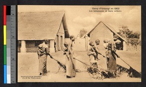 Young women sweeping with palm fronds, Congo, ca.1920-1940