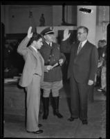 Judge Paonessa sworn in by Captain Cannon and Ray Cato, Los Angeles, 1933
