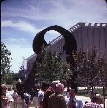 View of the dedication of the Indo Arch sculpture at the entrance to the Downtown Plaza on K Street at 4th