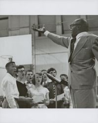 Jester Harrison, choral conductor, leads a group of singers, Petaluma, California, November 12, 1954