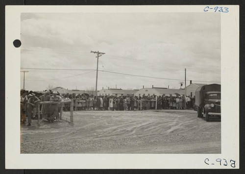 Scene as first group of Army volunteers leave for Fort Douglas, Utah, to be inducted. Photographer: Bankson, Russell A. Topaz, Utah