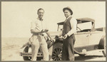 [Alfred Fuhrman and young man standing next to car]