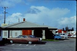 Back of the historic Petaluma & Santa Rosa Railway depot looking north, in use as Clarmark Flower Shop at 261 South Main in Sebastopol