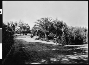 Road leading to the gardens of Smiley Heights, showing the home of Albert K. Smiley, Redlands, ca.1900