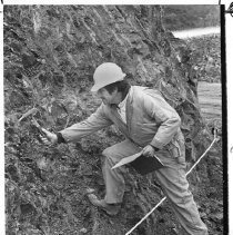 Reclamation geologist logs an outcrop for a seismic study as part of an earthquake analysis on the Auburn Dam project