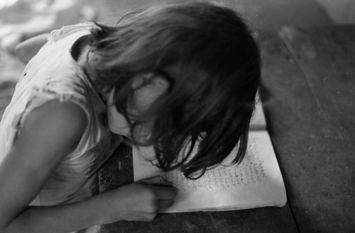 Young girl writing, La Chamba, Colombia, 1975