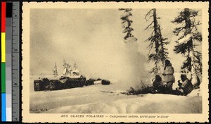People cooking over a fire amid a snowy forest, Canada, ca.1920-1940