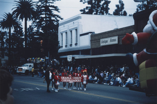 KLOS Radio's Mark and Brian "Day Before Thanksgiving" Parade with Orange Chiefs Cheerleaders walking down South Glassell Street, Orange, California, 1995