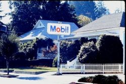 Mobil gasoline sign at the Mobil station on the corner of Willow Street and South Main Street, Sebastopol, California, 1970