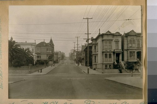 North on Scott St. from Pine St. Aug. 1924. The White House on the left with the Palms is the home of Dr. Thos. E . Schumate [Shumate]