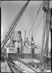 Sulphur being unloaded from the Panama Kobenhaun in Los Angeles Harbor, March 16, 1931