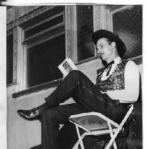 View of Frank Christy reading the program for the Centennial of the Pony Express Rerun in 1960