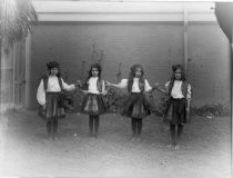 Four girls in costumes