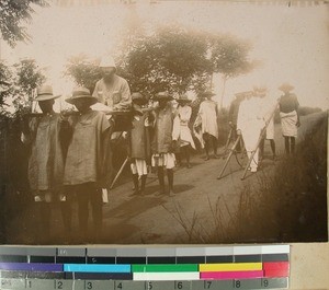 Missionaries and Malagasy men travelling together, Madagascar, ca.1905