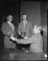 Two men receiving Electrical West awards for contributions to the literature of the electrical industry