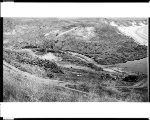 View of Rindge Ranch in Malibu from a rise above the Pacific Coast looking south across an estuary, ca.1935
