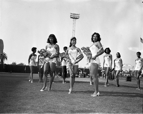 Pageant queens on a field, Los Angeles, 1955