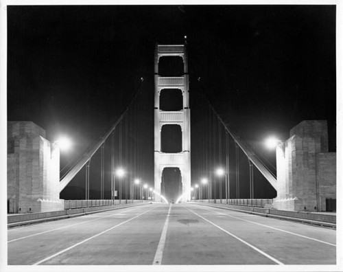 [Night view of Golden Gate Bridge tower]