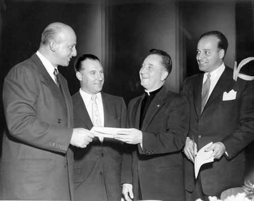 [Joseph Alioto with "Father Larry" Byrne, Ralph Montali, and Judge John B. Molinari]