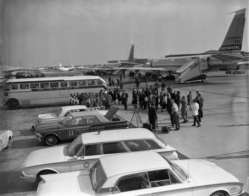 Korean war orphans at airport, Los Angeles, 1963