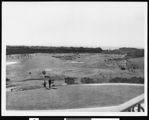 A panoramic view of a golf course at Riviera Country Club, ca.1920