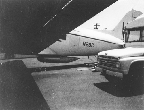 In 1962 Applied Oceanography Group (AOG) at Scripps Institution of Oceanography leased this DC-3 airplane ("N28C" identifying numbers shown on the side of plane in this photo). Later the plane would be given to them for continued research; AOG then mounted a infrared radiometer to measure heat flow from the ocean in the plane. With the airplane it was possible to survey 10,000 square miles of sea surface in 24 hours. Circa 1965