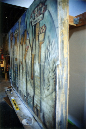 Side view showing lumber edging and plywood backing used during storage and shipping of the El Dia del Mercado mural by Alfredo Ramos Martinez, 2003