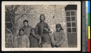 Schoolboys standing outside a brick building, Haizhou, Jiangsu, China, ca.1910-1930