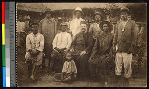 Missionary father sitting with a group of catechists, Congo, ca.1920-1940