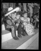 Three Mexican American children in costumes at Re-Enactment of 1769 Portola expedition Los Angeles, Calif., 1948