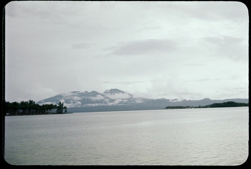 Landscape of the coast and distant mountains
