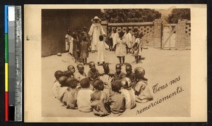 Children playing a game with a missionary sister, Kasongo, Congo, ca.1920-1940