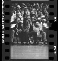 UCLA basketball coach Gene Bartow courtside during game in 1976