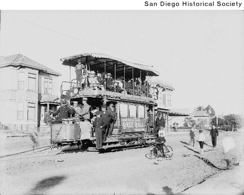 People on a double-deck streetcar operated by the San Diego Electric Railway