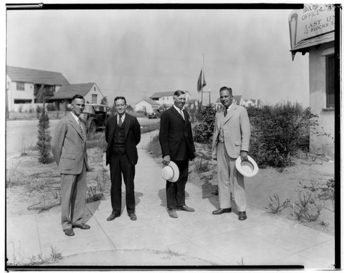 Four salesmen in front of subdivision sales office, East Mountain. Pasadena. 1928