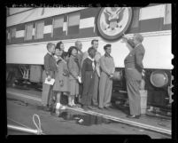 Robert P. Patterson and Dr. William Lindsay Young with children besides Freedom Train during it's stop in Los Angeles, Calif., 1948