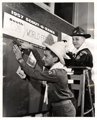 [Eagle Scouts Peter Wronsky and Jeff Andersen working on the World Friendship Fund booth at the 1957 Scout-O-Rama at the Cow Palace]