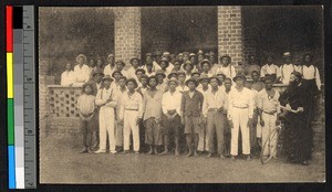 Catechists standing together with a missionary father, Congo, ca.1920-1940