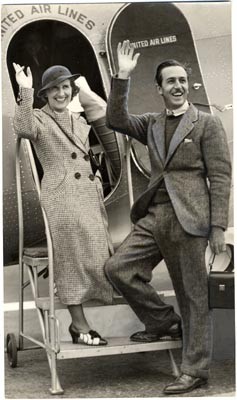 [Walt Disney and his wife boarding a plane for San Francisco]