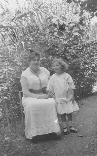 Ruth and Birdella Hill in the garden at 1350 Sherman St. in San Jose