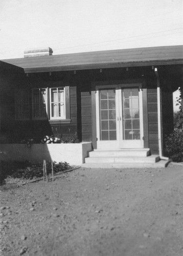 A. G. Ochsner residence, view of French doors and steps leading to backyard