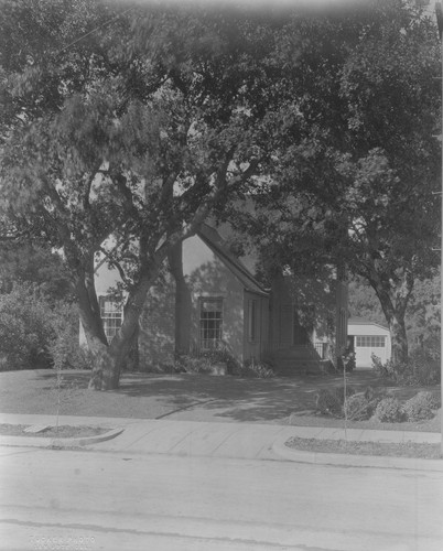 Exterior view of Vrendenburgh driveway and house from the street